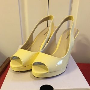 Peep toes sling back with platform